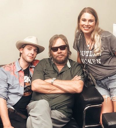 Katherine Williams-Dunning with Father Hank Williams Jr. and brother Samuel Williams
