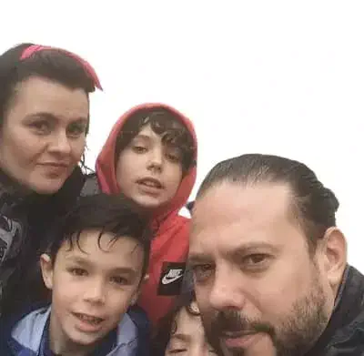 Asier Flores with his father Francisco Javier Flores Romero and siblings