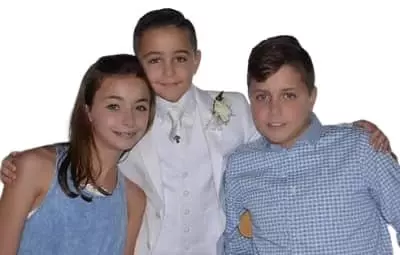 Ava Majury with her brothers