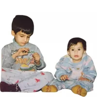 Pegah Ghafoori with her brother