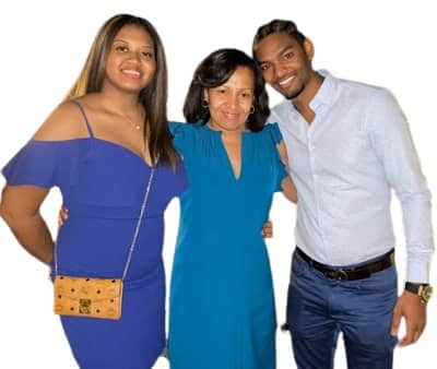 Sylvester Powell with his mother and sister Mya Riddles