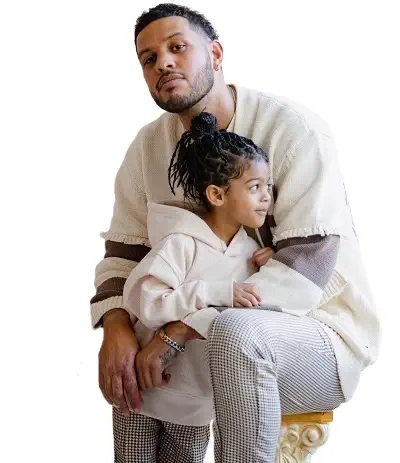 Sarunas J Jackson with his daughter Zen