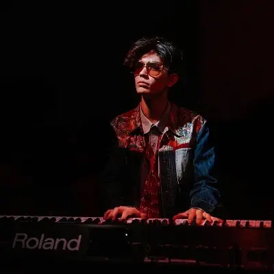 William Gao playing electronic piano