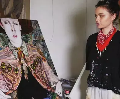Jess Bush showing her painting