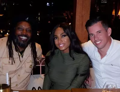 Lesa Milan Hall and her husband with Cricketer Chris Gayle