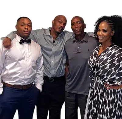 Brandee Evans with father and brothers