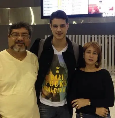 Felipe Gomes with his father and mother