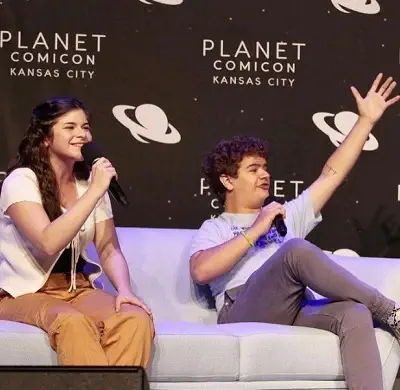 Gabriella Pizzolo with Dustin Henderson during Planet Comicon