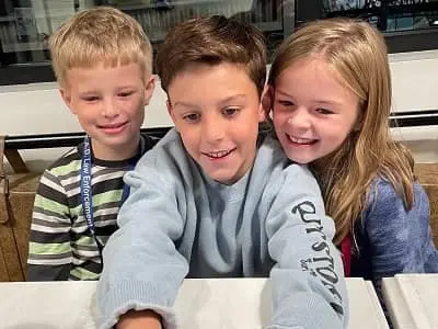 Logan Marmino with his siblings