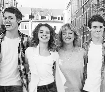 Oscar Lesage with his mother, brother and sister