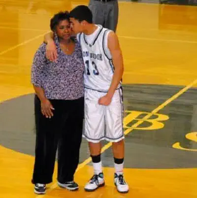 Timmy Pandolfi with his mom in basketball arena