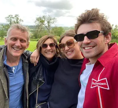 Charlie Rowe with his parents and sister