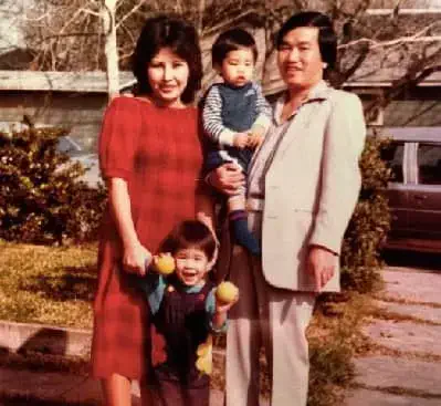 Washington Ho with his father mother and sister