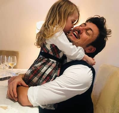 Andrea Giambruno with his daughter