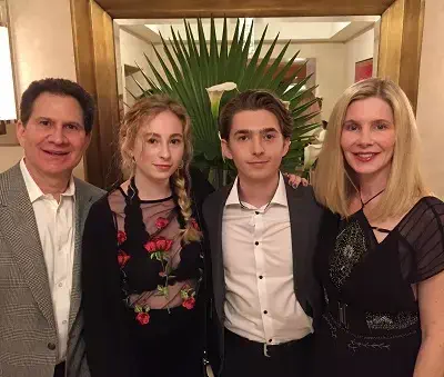 Austin Abrams with his father mother and sister