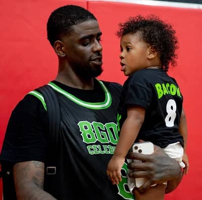 Dwayne Bacon with his daughter