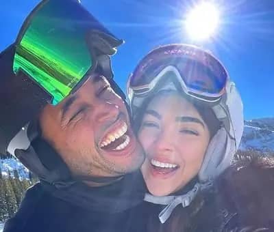 Eilyn Jimenez with Ray Jimenez on a skiing trip