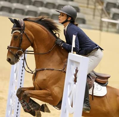 Elizabeth Scherer riding horse