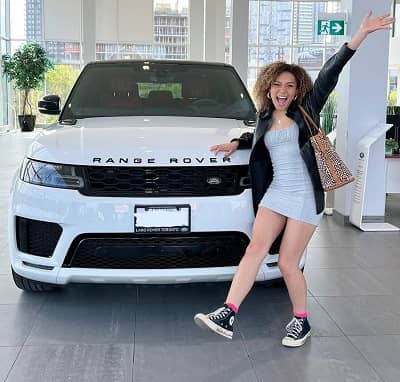 Kamaia Fairburn with her Range Rover Sport