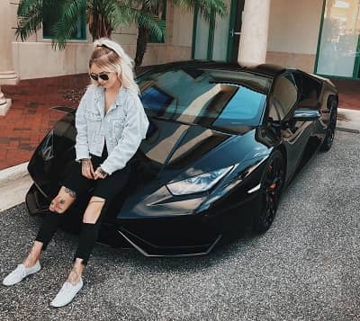 Victoria Triece with her car