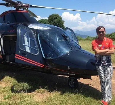 stephen hung with his private helicopter
