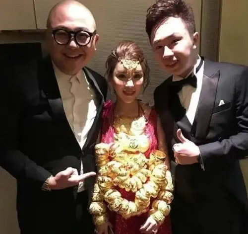 Abby Choi with her husband Chris and Bob Lam