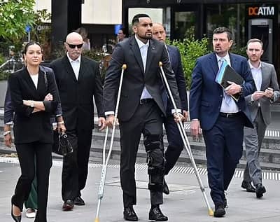 Nick Kyrgios walking out of court