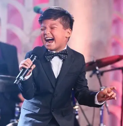 Tyson Venegas singing childhood image