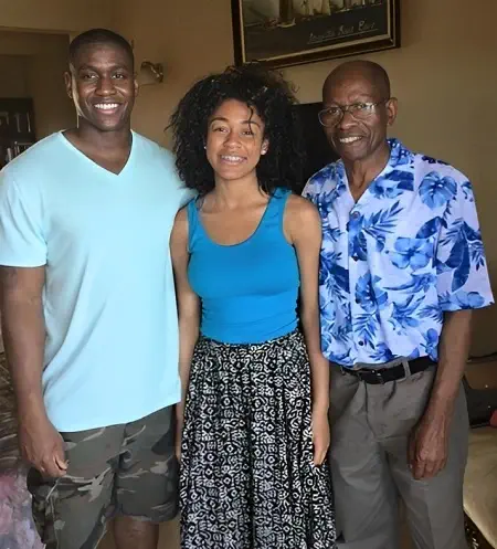 Mia Kanu with her father and brother