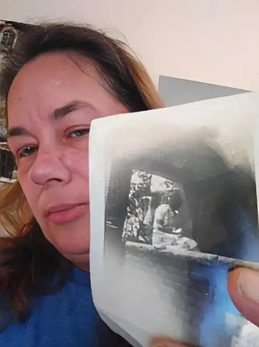 Aprille Franco showing photo of her grandmother Fern Franco