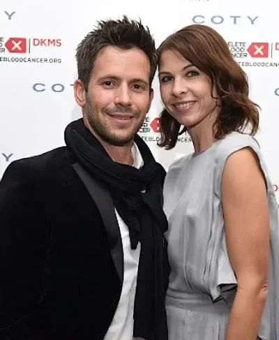 Christian Oliver with wife Jessica Mazur